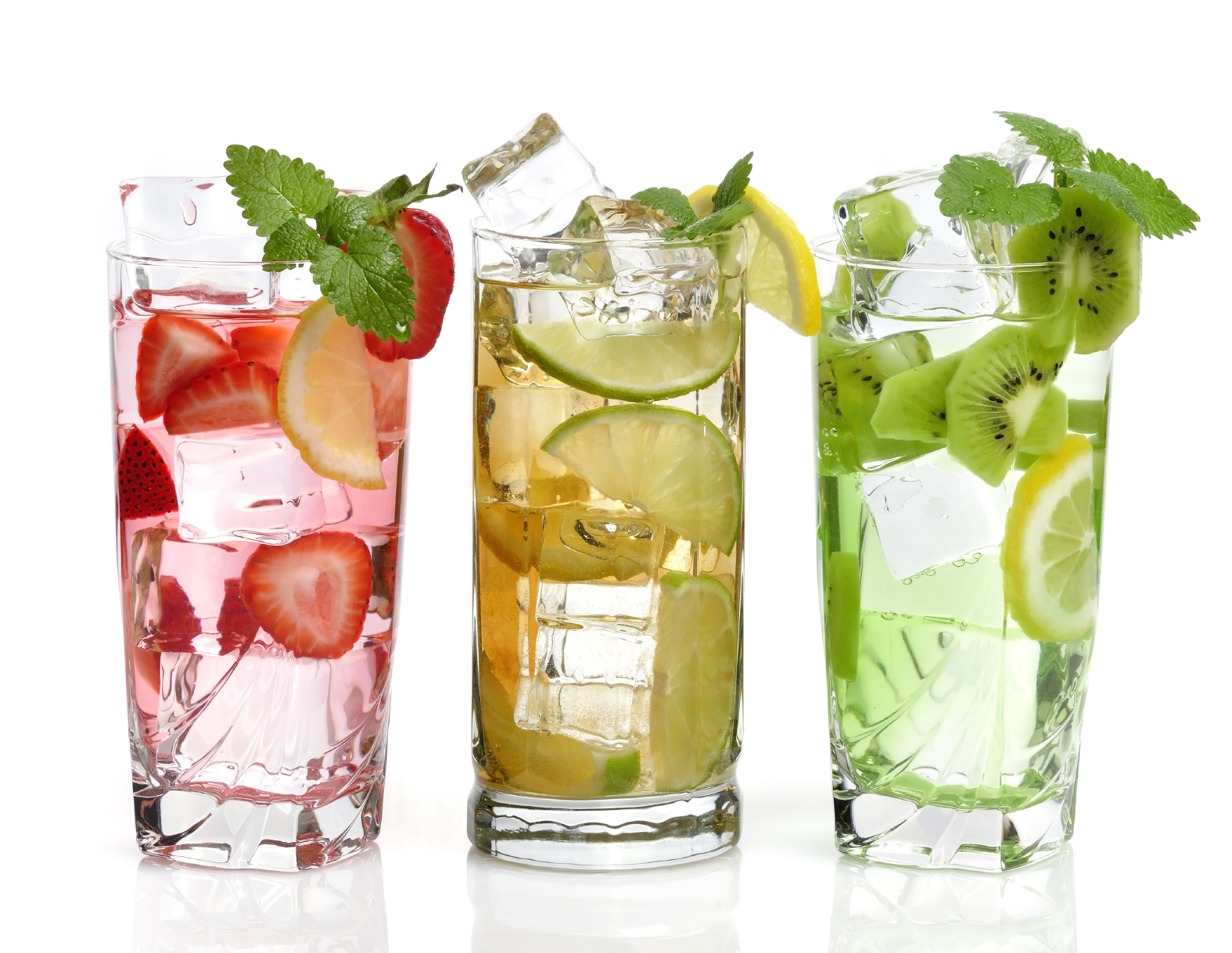 Glasses Of Drink With Ice Cubes And Fruits On White Background